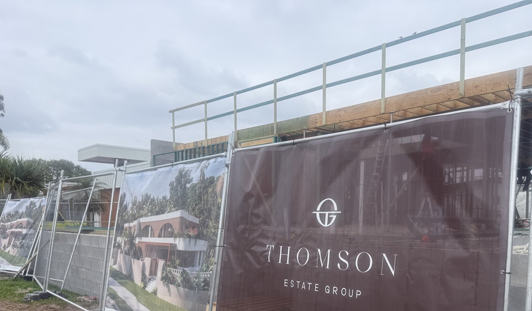 Thomson Estate Group mesh banner on temporary fencing at a new development in Marcoola, Sunshine Coast