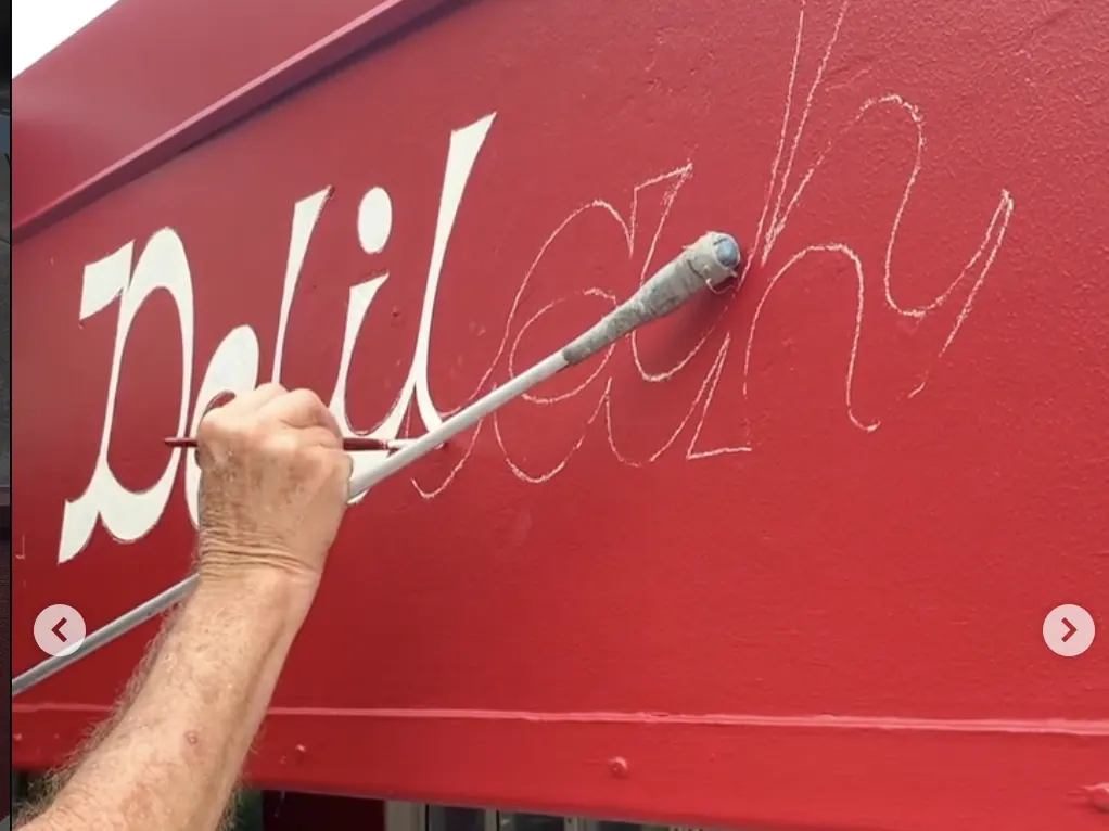Delilah — Hand-painted fascia by Sykes Signs