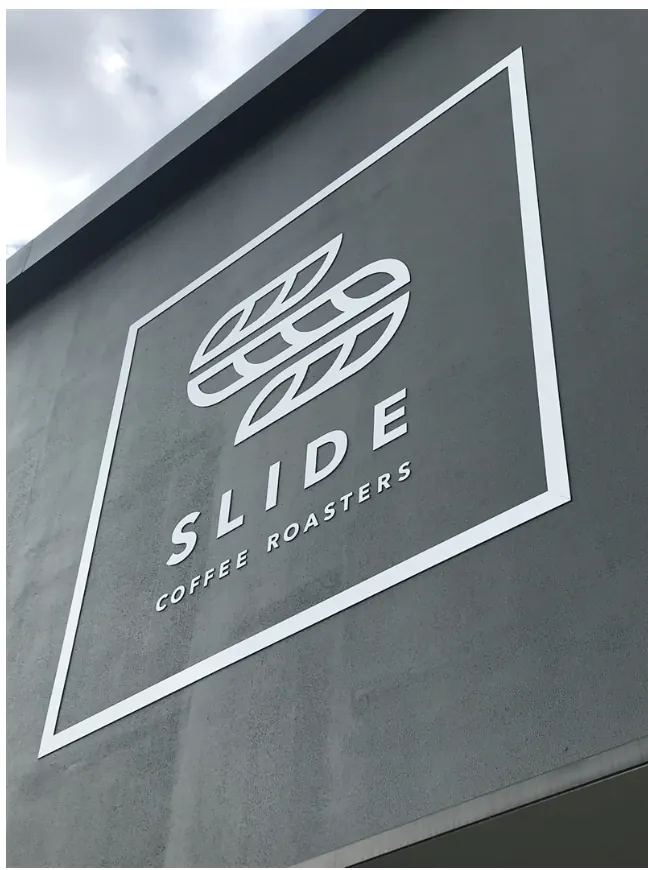 Slide Coffee Roasters — Cut metal wall sign by Sykes Signs
